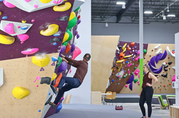 Image of people bouldering at Big Island Bouldering in Plymouth